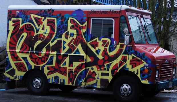 Main St Van Graffiti on car