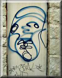 Face-On-Pole Graffiti