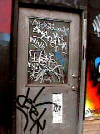 Graffiti scrawls on Door, Cobalt Hotel, Vancouver Graffiti scrawls on Door, Cobalt Hotel, Vancouver